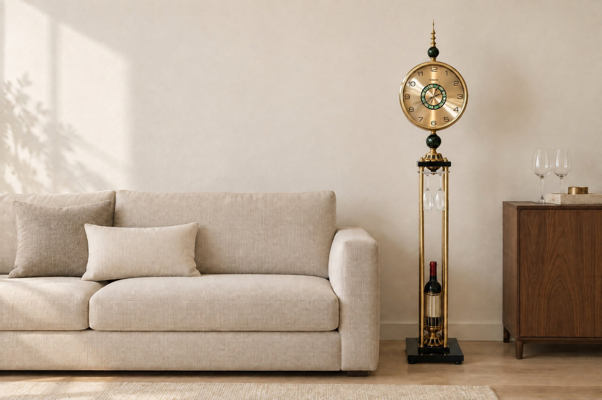 Barrel & Brass Time Tower beside a linen sofa, two wine glasses hanging under its top and a bottle in its cage, showing its 161 cm height