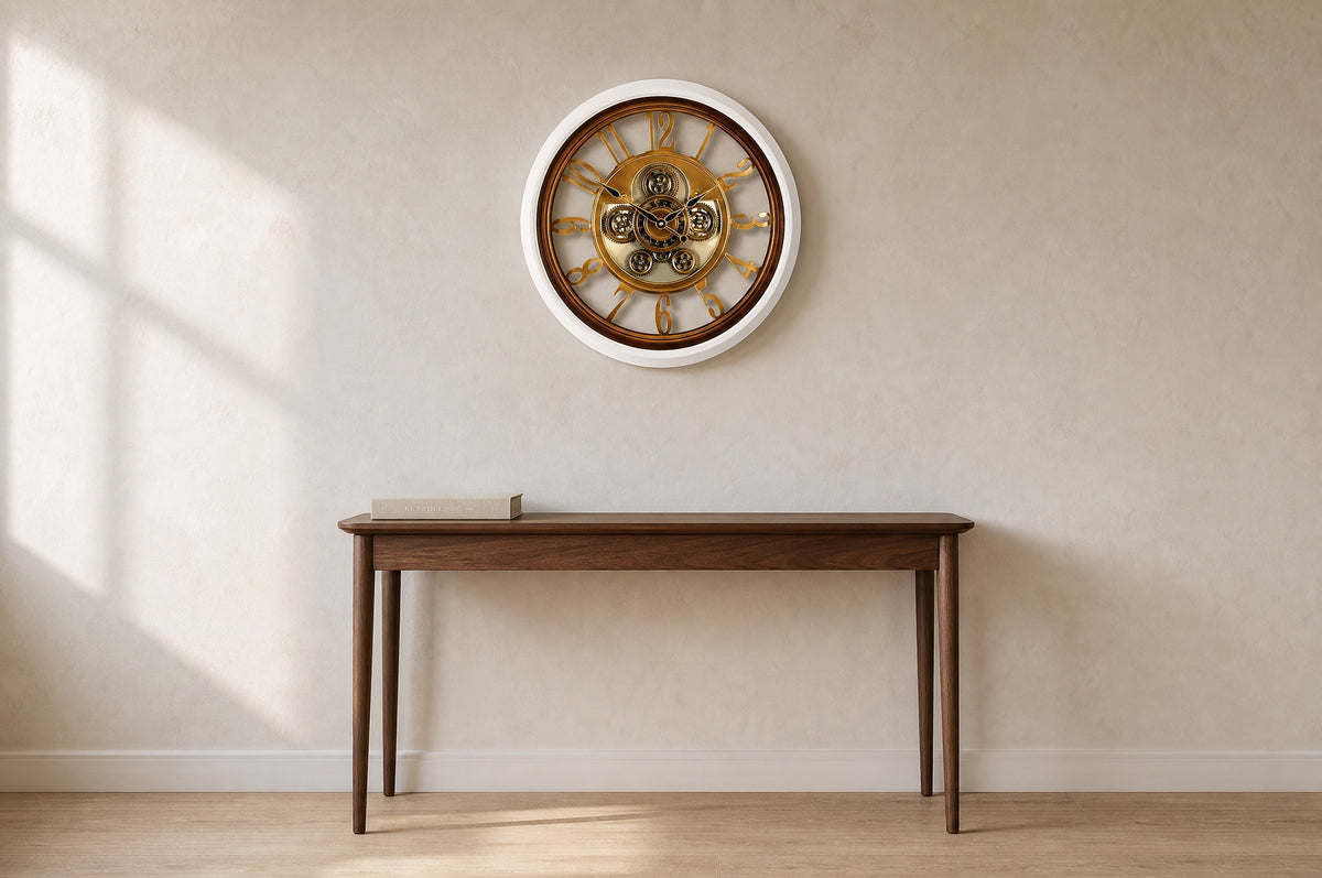 Snow Frame wall clock hung above a slim walnut console in a calm hallway, showing its 48 cm size