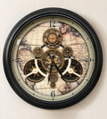 Traveler's Gear wall clock with an antique world map dial and gold gears in a black metal frame, front view on an ivory wall